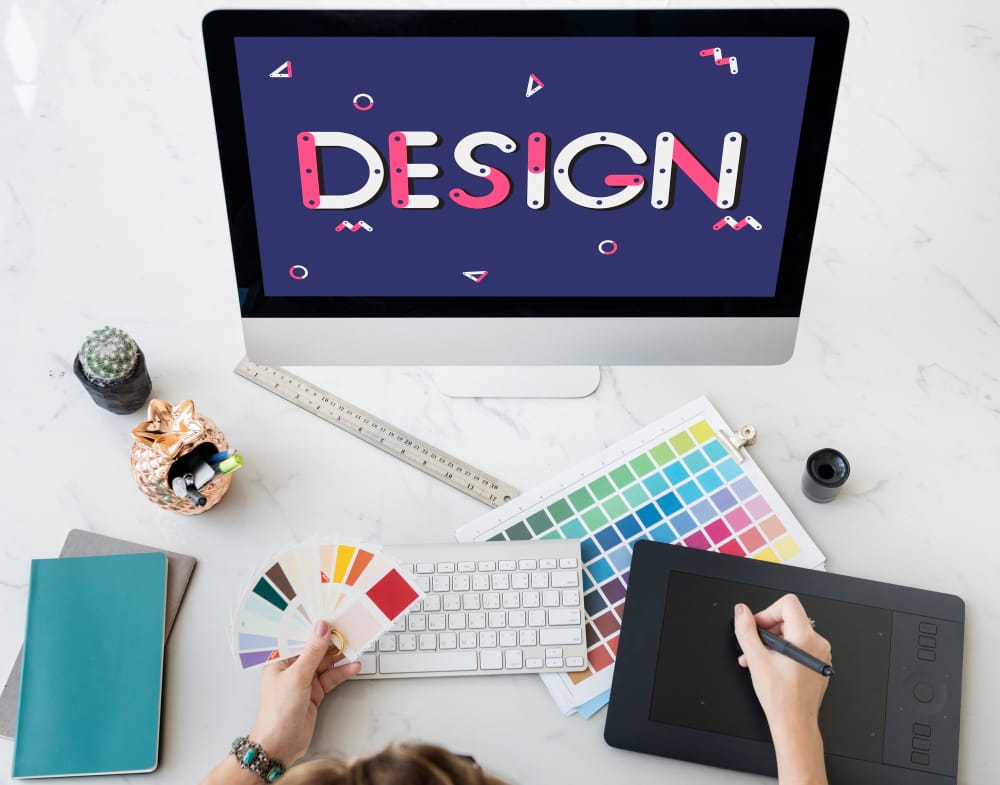 Modern graphic design workspace with color swatches and digital tools for creative branding and digital solutions.