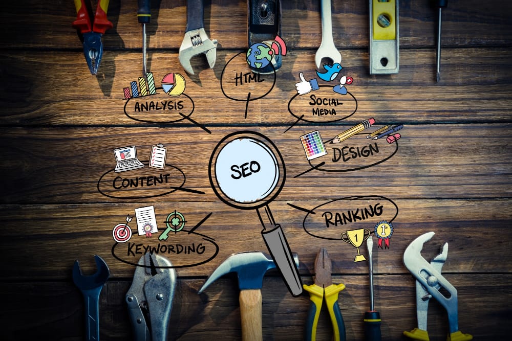 SEO tools and analytics concepts depicted with tools on a wooden surface for digital marketing optimization.